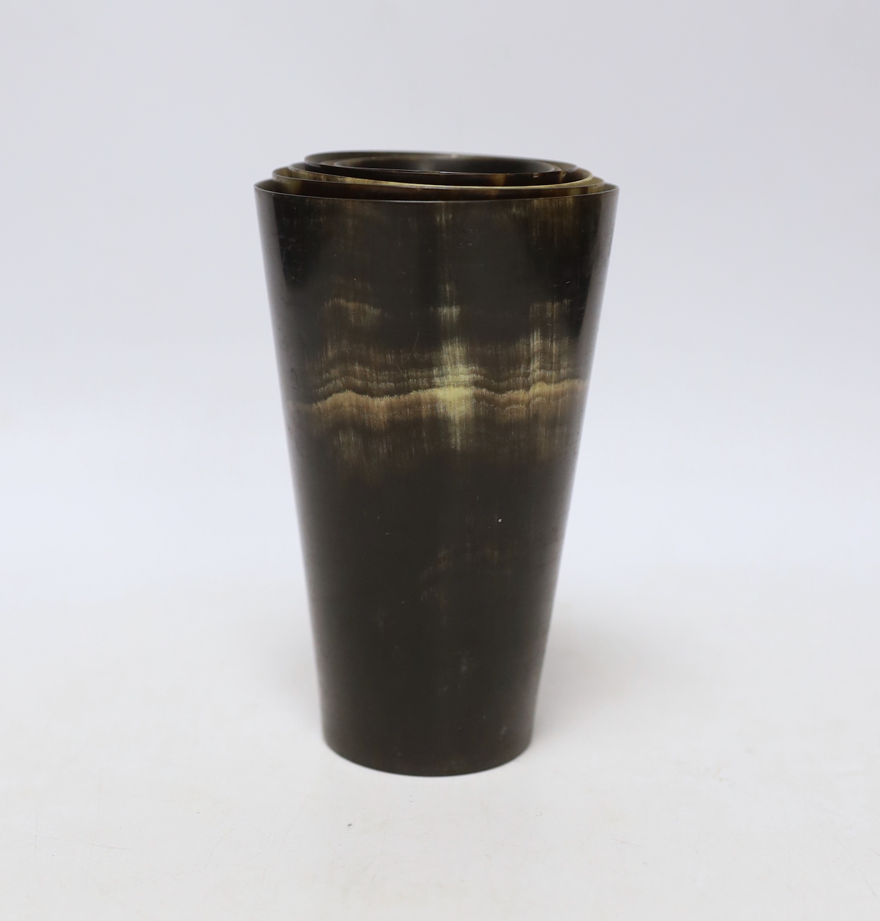 A graduated set of six Victorian horn beakers, largest 12.5cm